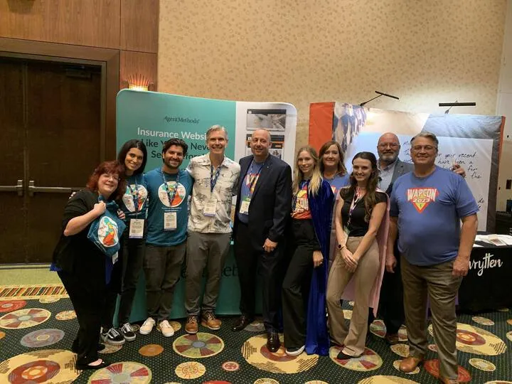 The AgentMethods team with agents at a conference reception